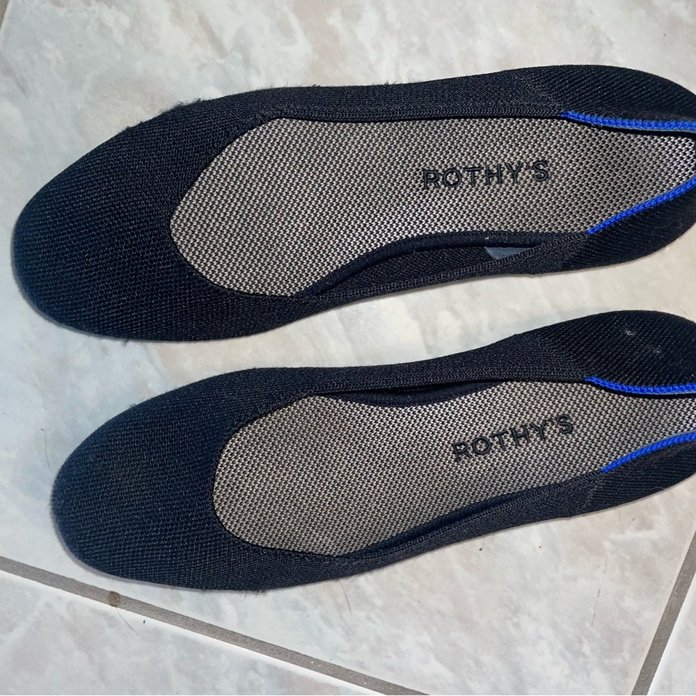 Rothy's Black Slip-On Flats with Blue Accent